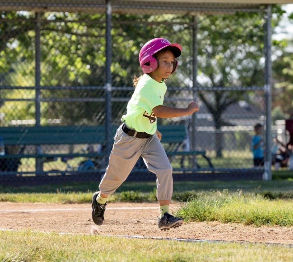 A softball player running