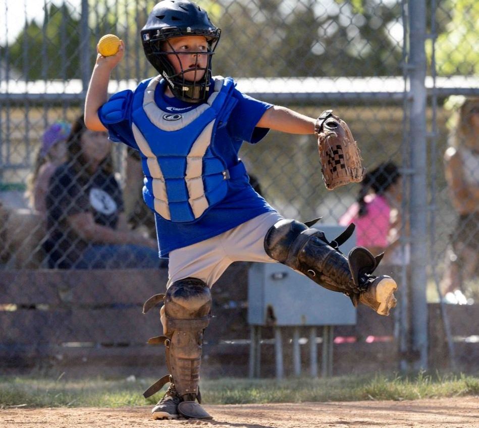 A baseball player throwing a ball